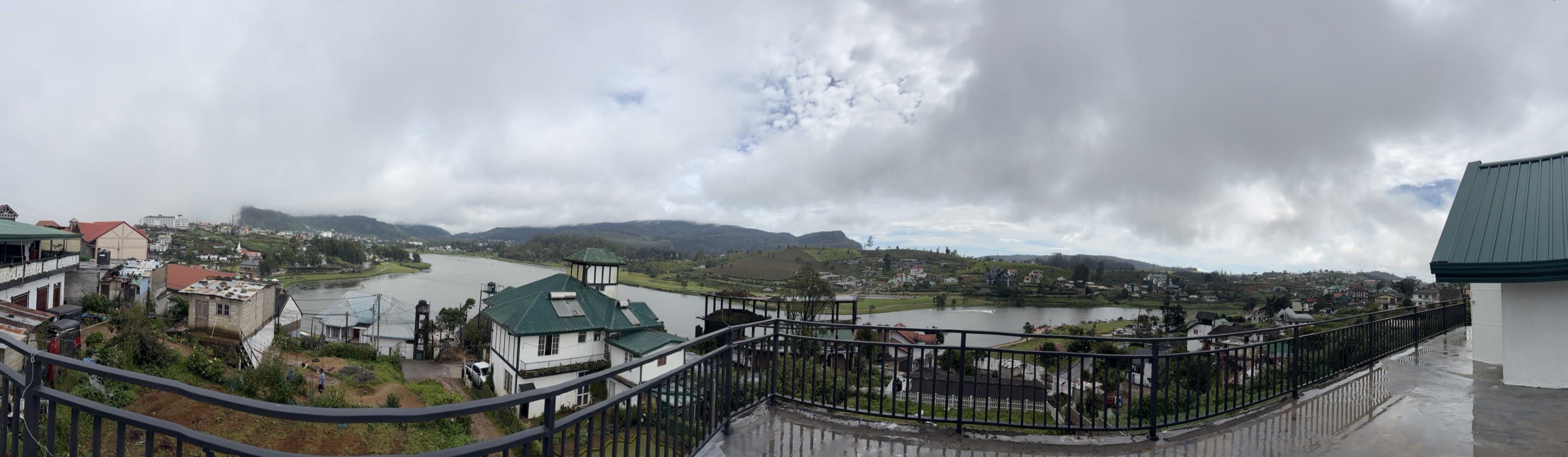 Panoramic view of Gregory Lake and the surrounding hills from Spring Mist Villa's balcony